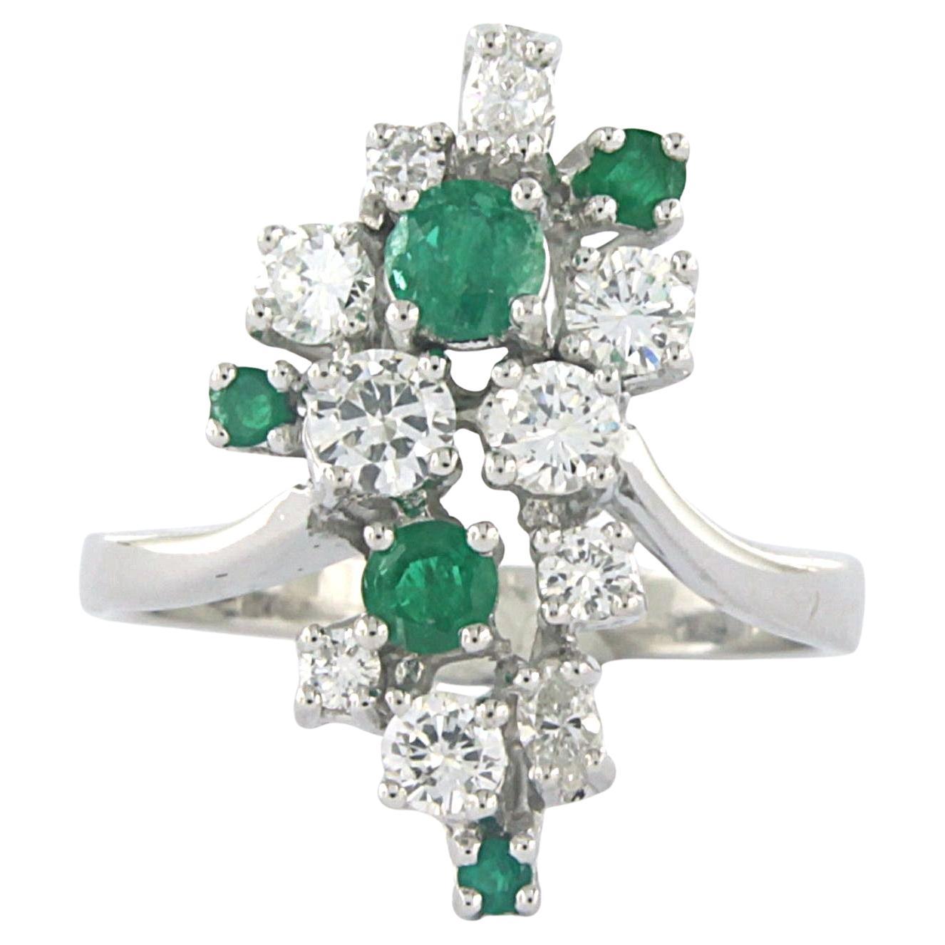 Ring with emerald, brilliant and marquise cut diamonds up to 0.85ct 14k gold