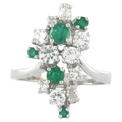 Ring with emerald, brilliant and marquise cut diamonds up to 0.85ct 14k gold