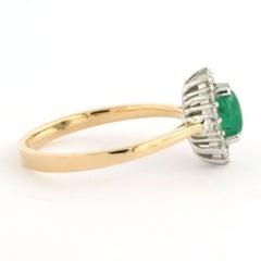 Anello con smeraldo fino a 0,74ct e diamanti taglio brillante fino a 0,26ct in oro 18k