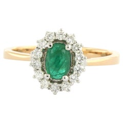Ring with emerald up to 0.74ct nd brilliant cut diamonds up to 0.26ct 18k gold