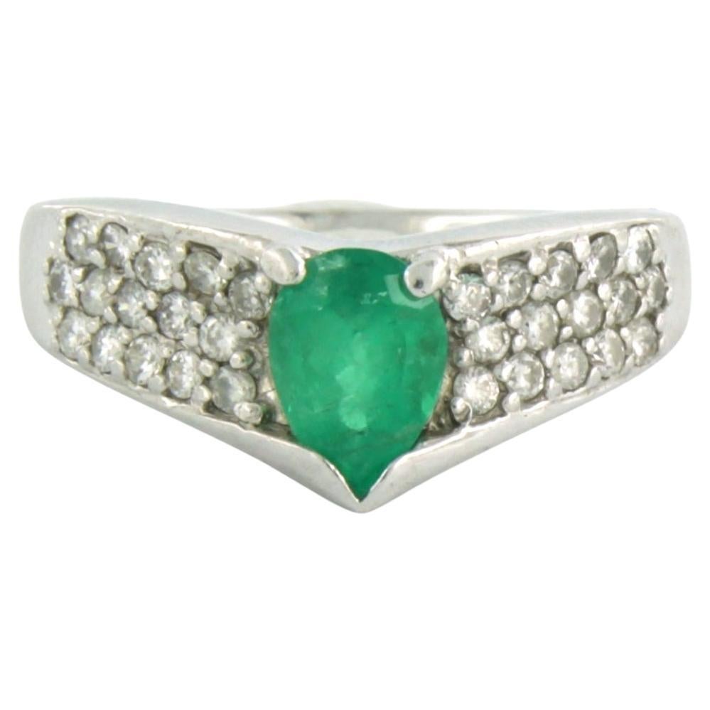 Ring with emerald up to 0.80ct and brilliant cut diamonds up to 0.45ct Platinum For Sale
