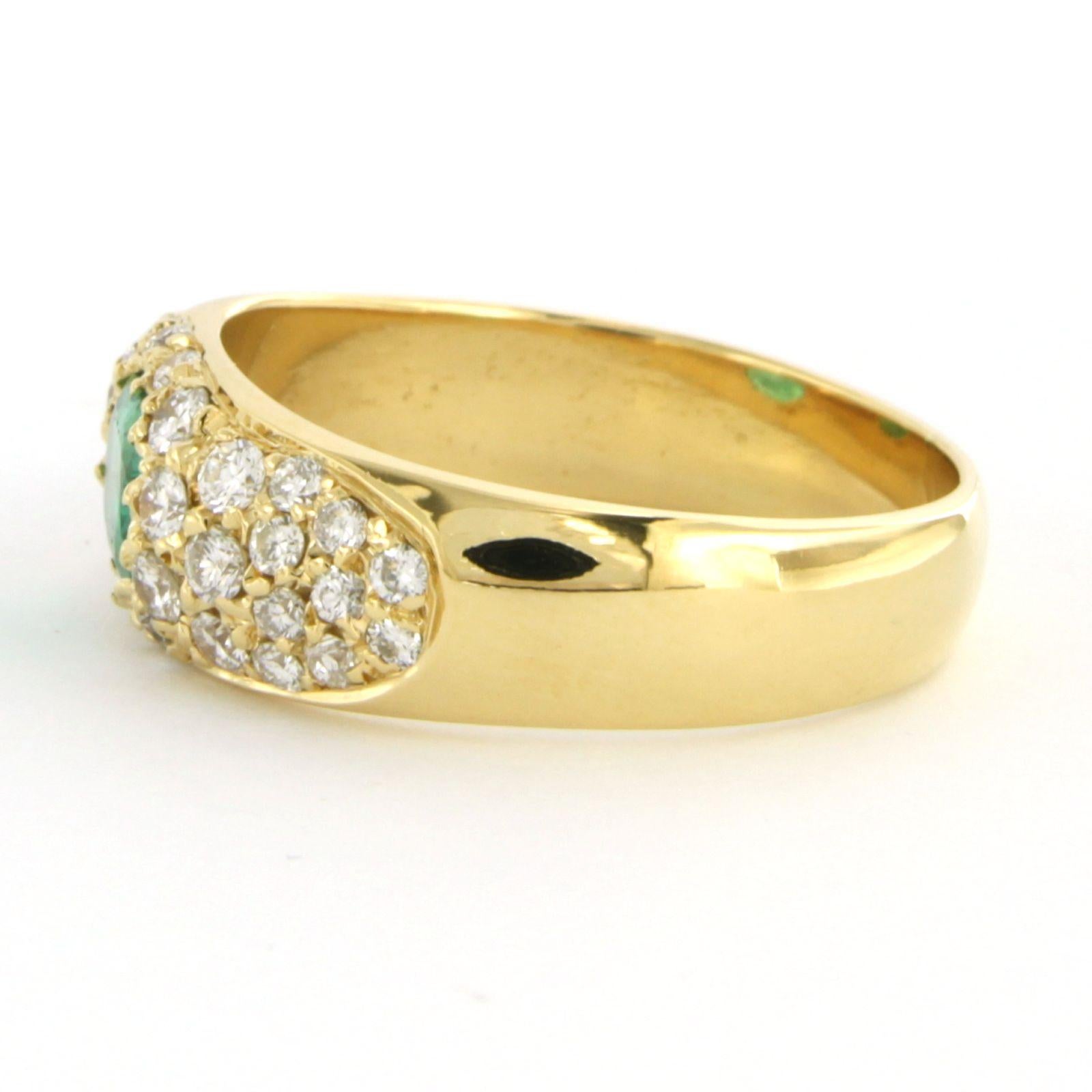 Ring with emerald up to 0.95ct and diamonds up to 0.75ct 14k yellow gold In Excellent Condition For Sale In The Hague, ZH