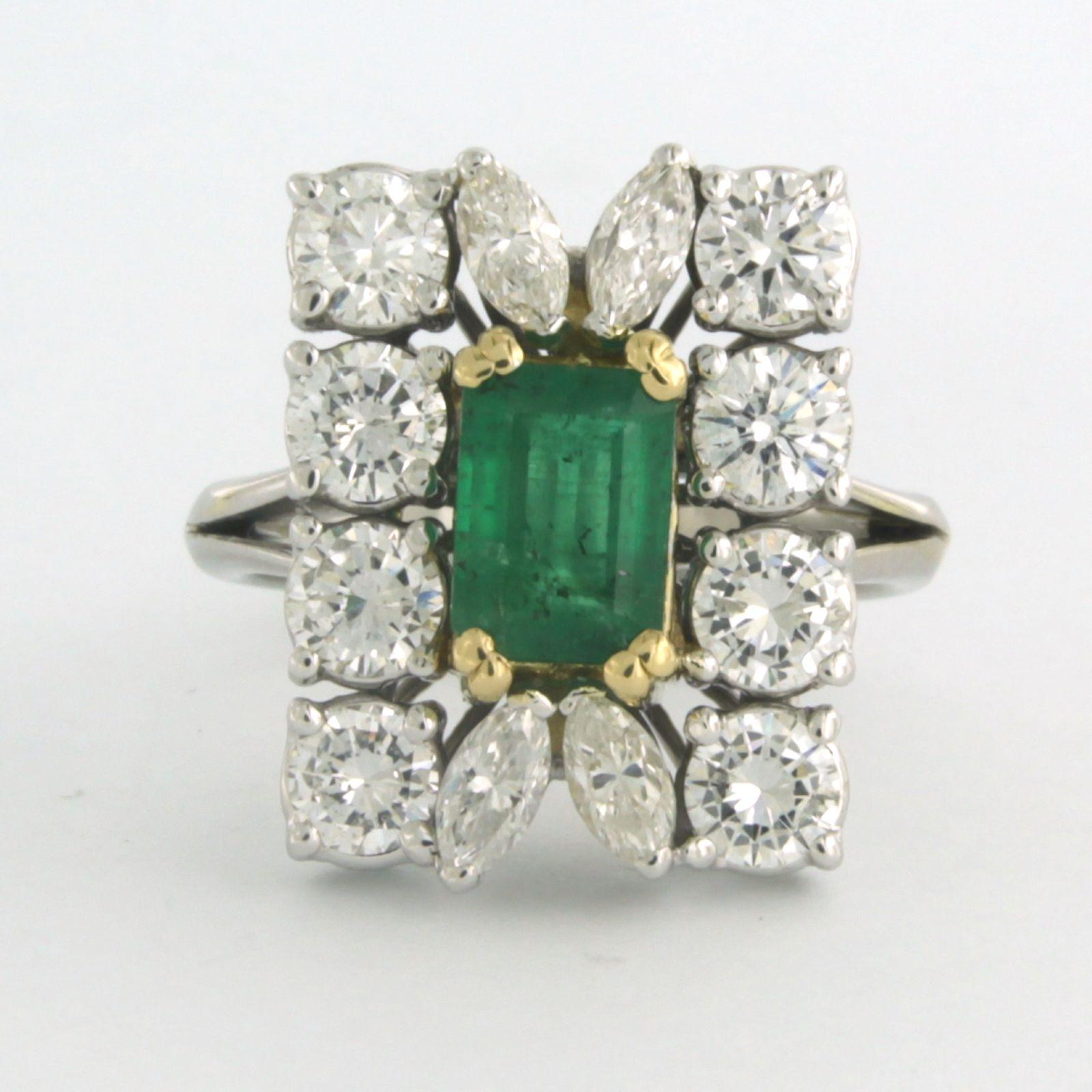 18k bicolor entourage ring set with emerald to. 1.50ct and entourage marquise and brilliant cut diamonds up to. 2.50ct - F/G - VS/SI - ring size U.S. 7.5 - EU. 17.75(56)

detailed description:

The top of the ring is in a rectangle shape measuring