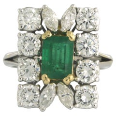 Ring with emerald up to 1.50ct and diamonds up to 2.50ct. 18k bicolour gold 