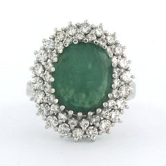Ring with emerald up to 4.00ct and brilliant cut diamonds up to 1.70ct 14k gold