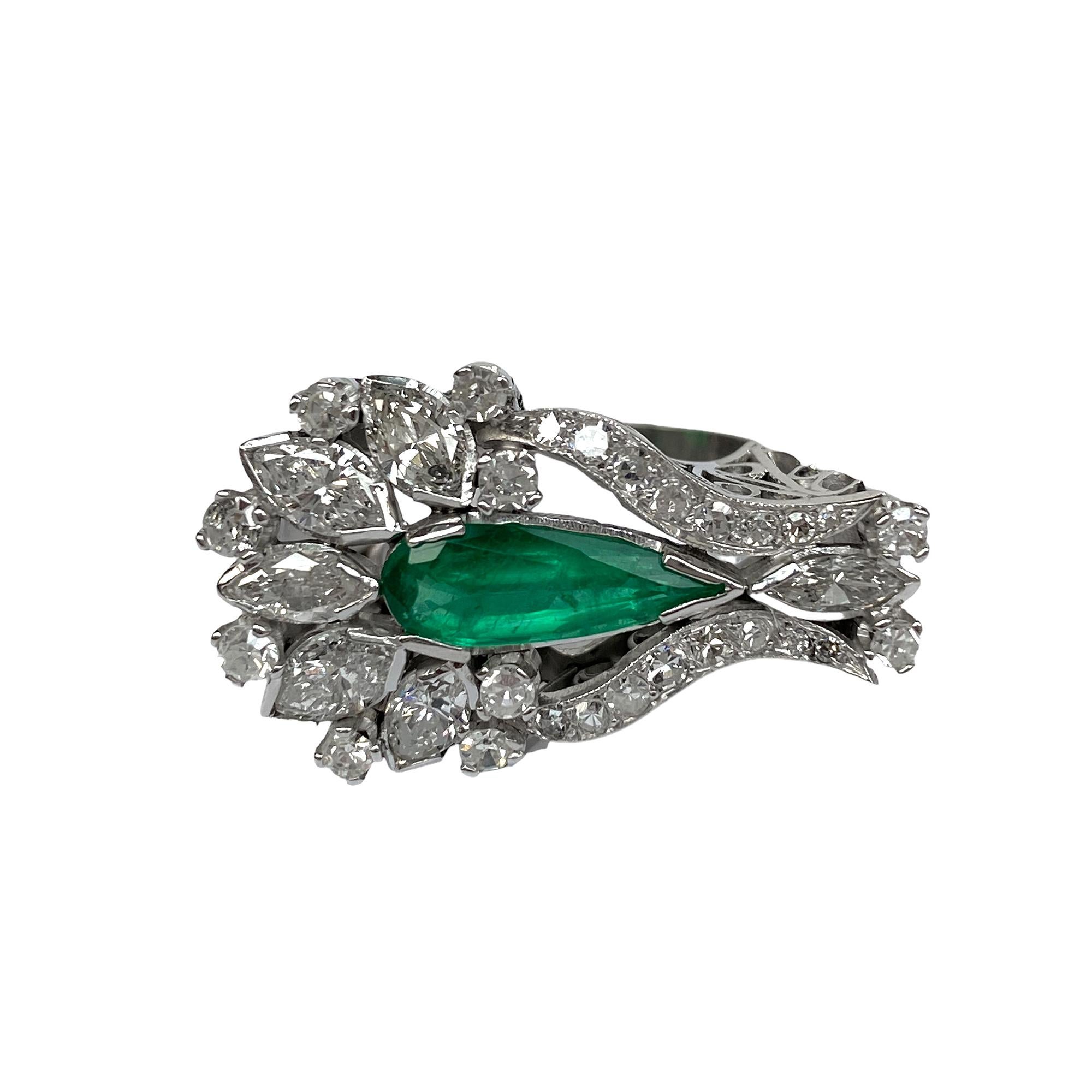 Perfect condition - quality grade of setting and polishing is good
Total weight:  9,22 grams
Diamonds round brilliant and marquise cut : 2,17 carats of white natural diamonds
Emerald : 1,90 carats - Origin Zambia
Ring Size : US 8 (if you need