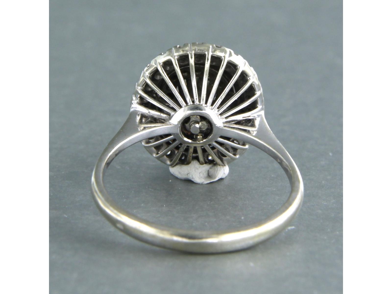 Bague en or blanc 18k sertie d'émail et de diamant brillant et taille unique jusqu'à 0.23ct/0.27ct F/G - VS/SI - taille de bague U.S. 7.25 - EU. 17.5 (55)

description détaillée :

le haut de l'anneau 1,4 cm de large par 9,5 mm de haut

l'émail est