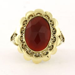 Ring with garnet 14k gold 5.5 grams