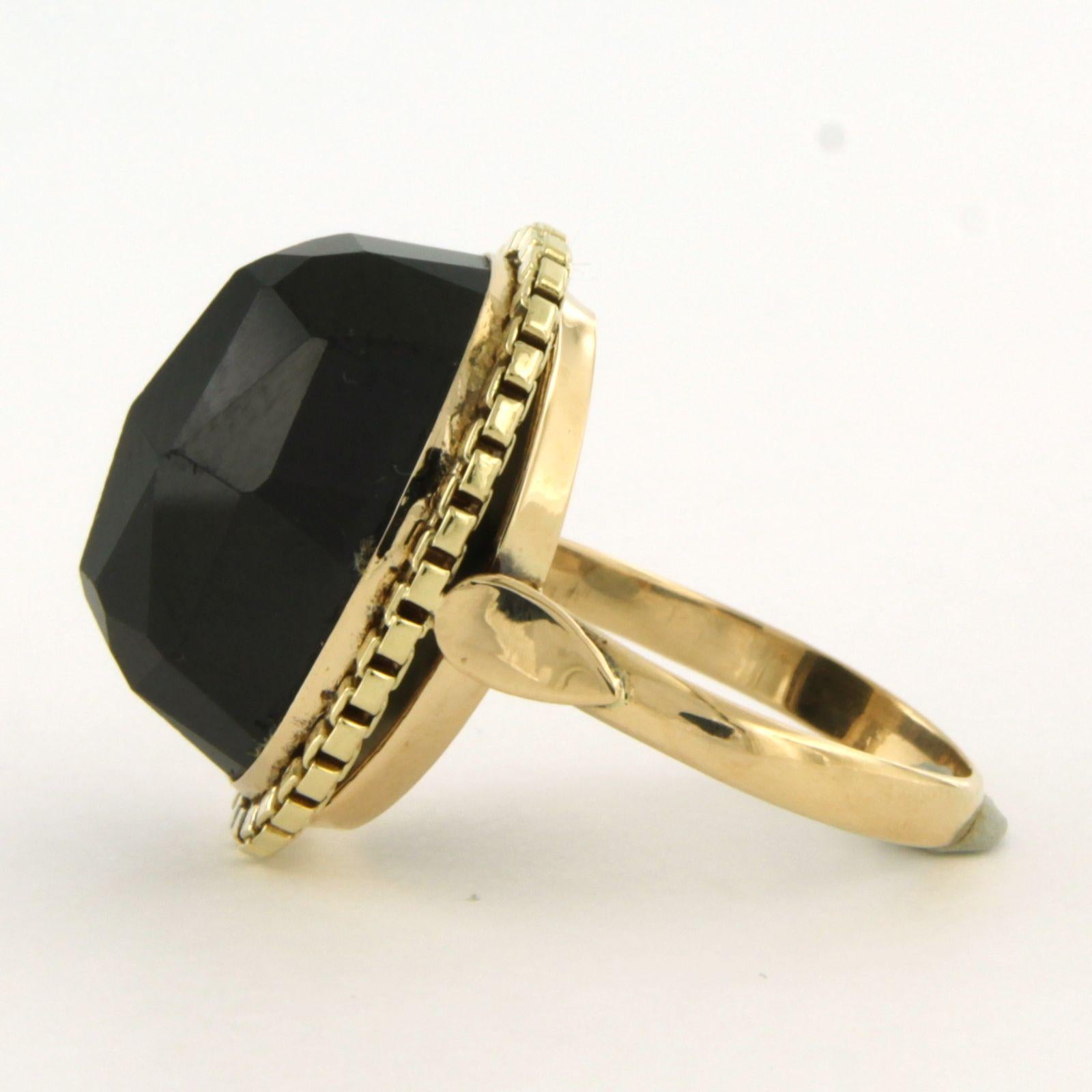 14k yellow gold ring set with garnet – 7.5 grams – ring size US 6.5 – EU 17(53)

Detailed description:

The top of the ring is oval, measuring 2.1 cm by 1.6 cm wide and 1.2 cm high.

Ring size US 6.5 – EU 17(53). The ring can be enlarged or reduced