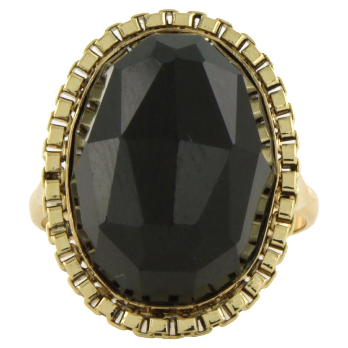 Ring with garnet 7.5 grams 14k yellow gold For Sale