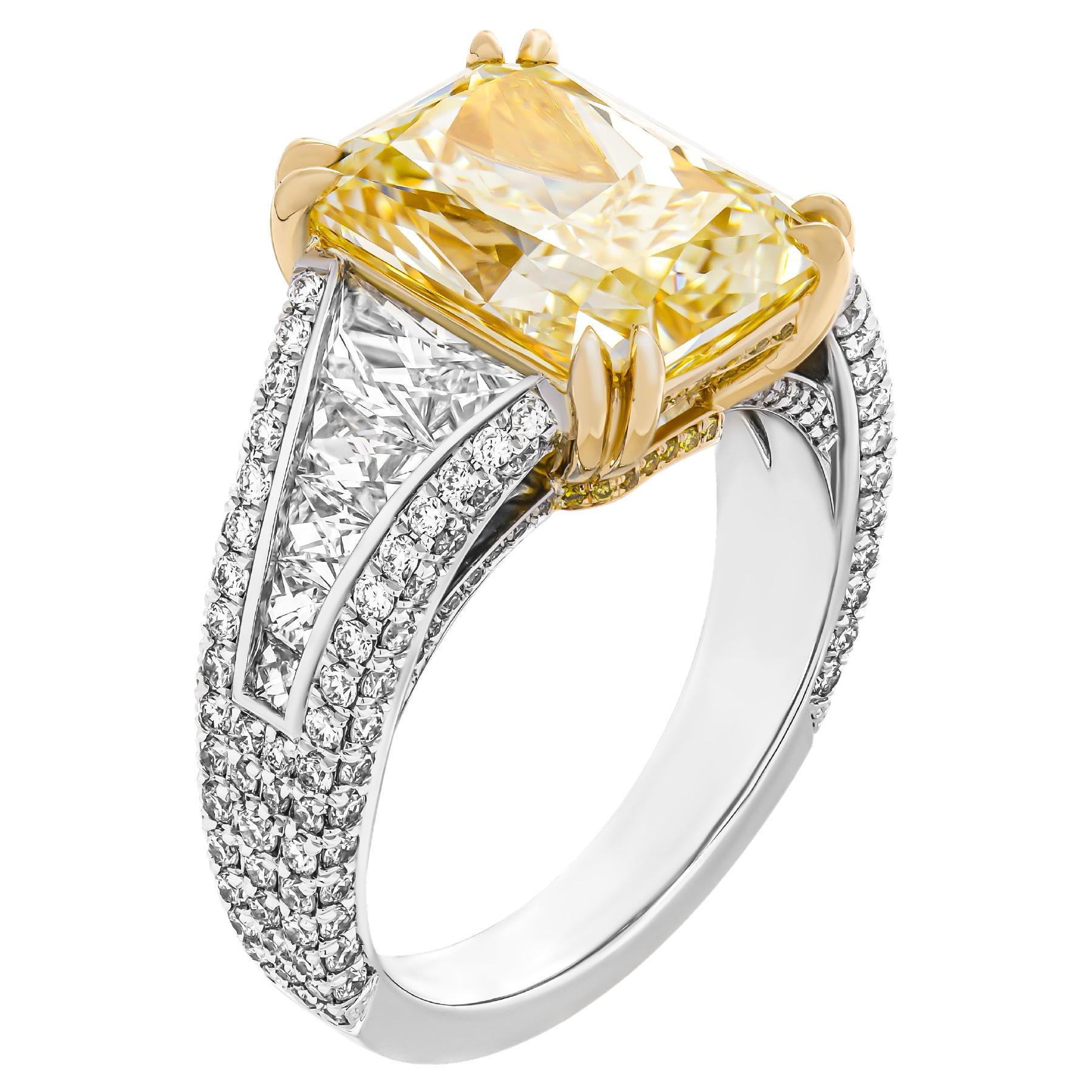 Ring with GIA 5.43ct Fancy Light Yellow Radiant and French cut Side Stones For Sale