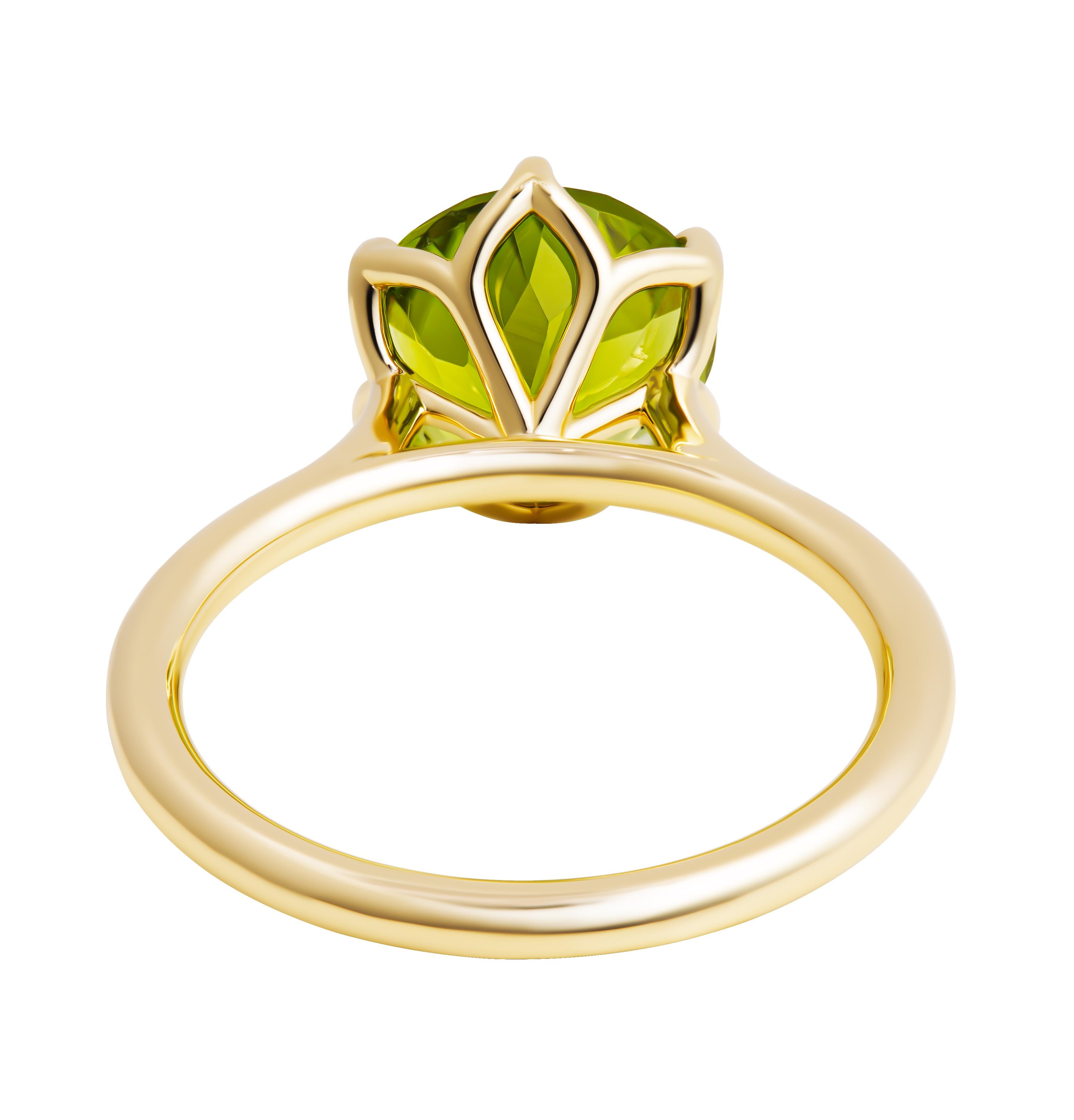 Ring with Green Peridot  in 14k YG 
Lotus Prong Design
Size: 6.25 (sizable)

Center Stone: 2.95ct Green Peridot 

