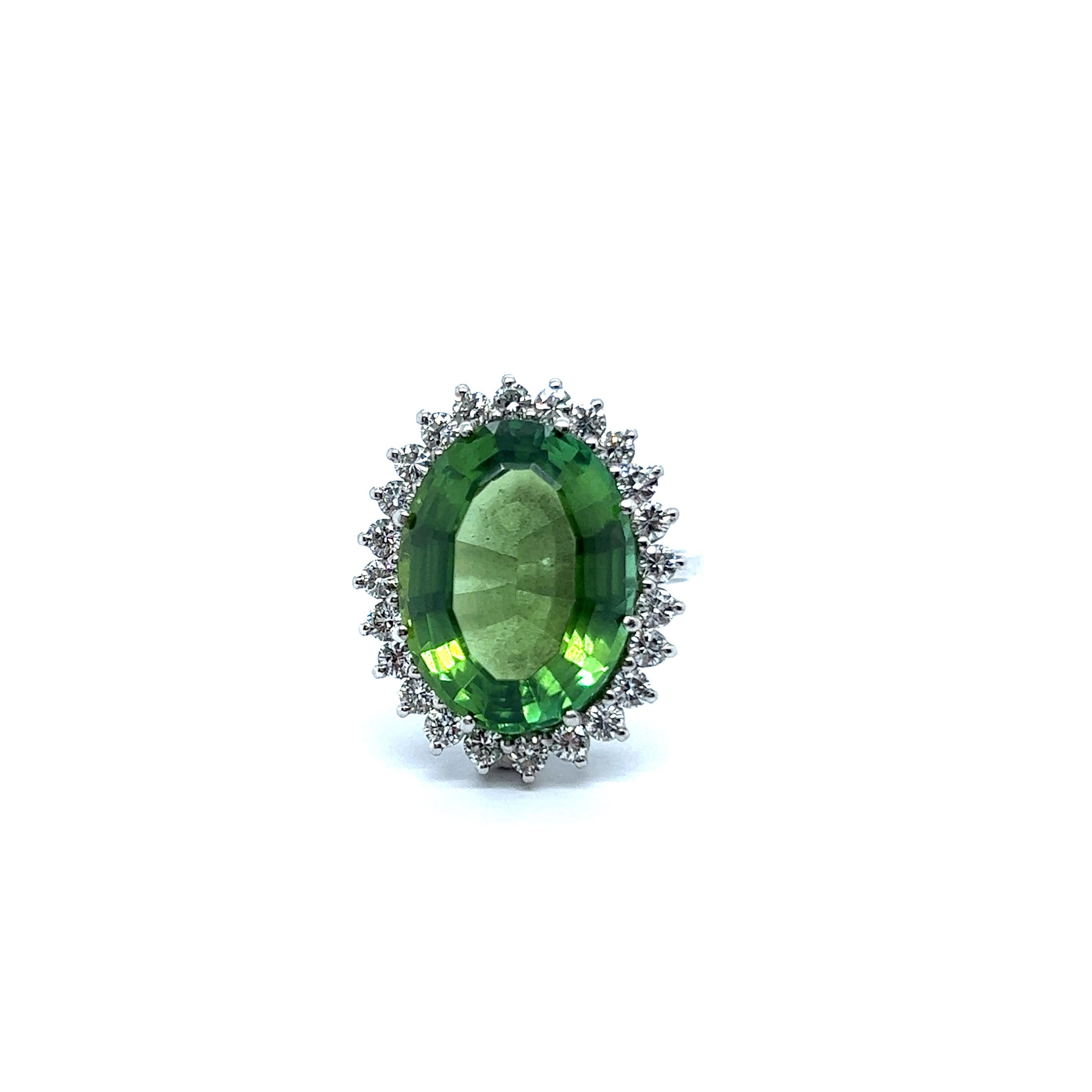 Oval Cut Ring with Green Tourmaline and Diamonds in 18 Karat White Gold  For Sale