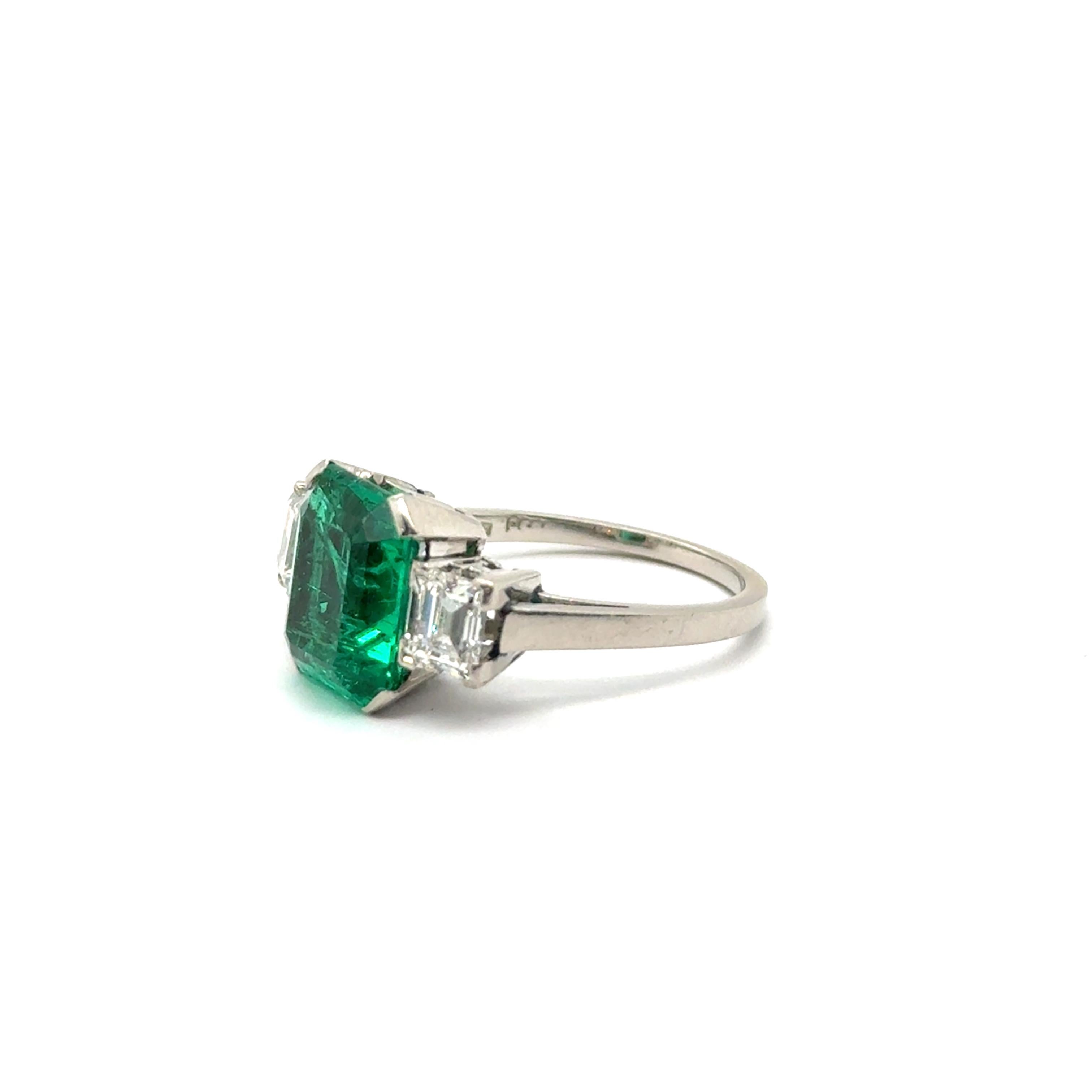 Octagon Cut Ring with Gubelin certified 3.25 ct Colombian Emerald & Diamonds in White Gold For Sale