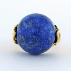 Ring with lapis lazuli 14.3 grams 18k yellow gold ringsize U.S. 8.5