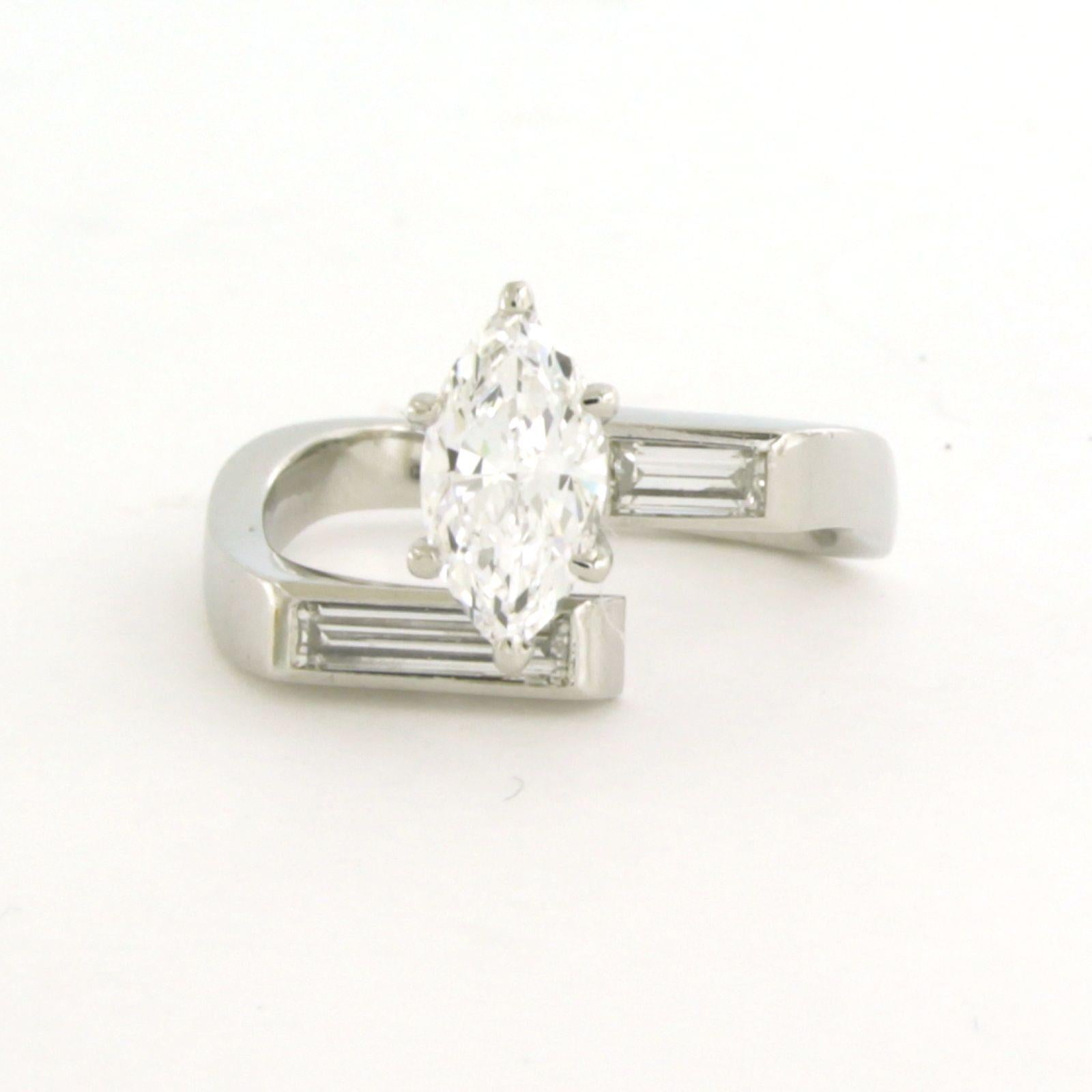 Platinum ring set with a central marquise cut diamond up to 0.90 ct and a baguette cut diamond up to 0.50 ct - ring size US 6.5 - EU 17 (53)

Detailed description

The top of the ring is 1.3 cm wide and 8.5 mm high.

weight: 8.0 grams

Ring size US