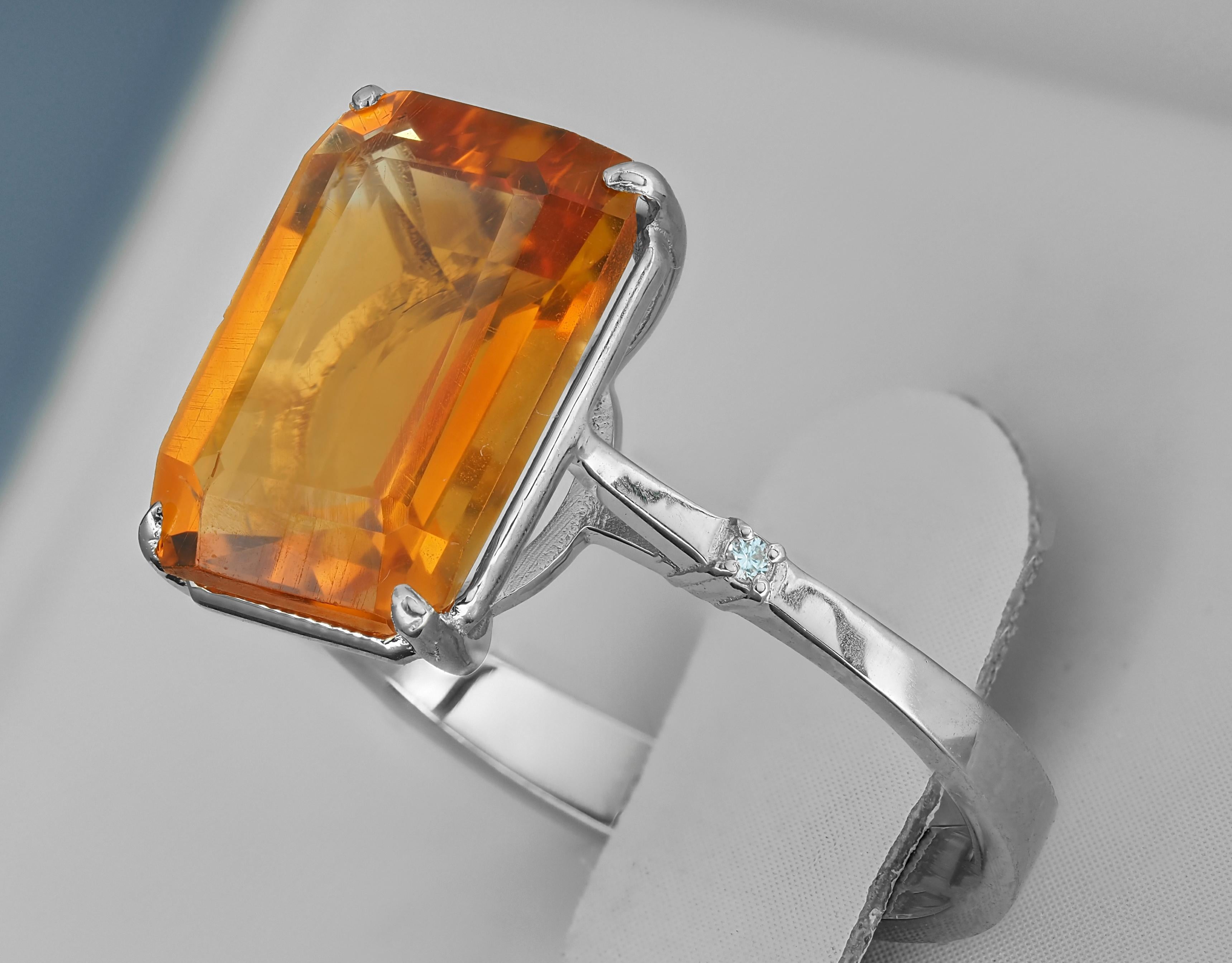 Ring with natural citrine and diamonds.
Natural citrine ring. Yellow citrine ring. 

Metal - Sterling Silver
Weight - 3 gr depends from size
Set with citrine, color - yellow
Emerald cut, aprox 3 ct. in total (11.5x8.5mm)
Clarity: Transparent with