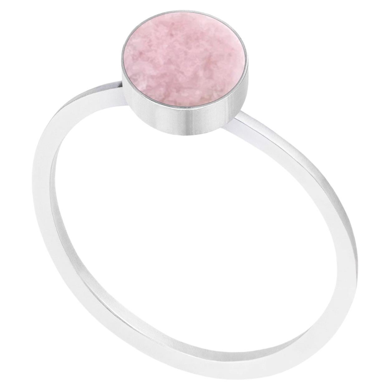 Discover the elegance of our minimal silver ring with a stunning pastel pink natural stone. Elevate your style with this delicate piece that combines simplicity and beauty.

The stone that adorns the ring is rodingite, rare metamorphic rock sourced