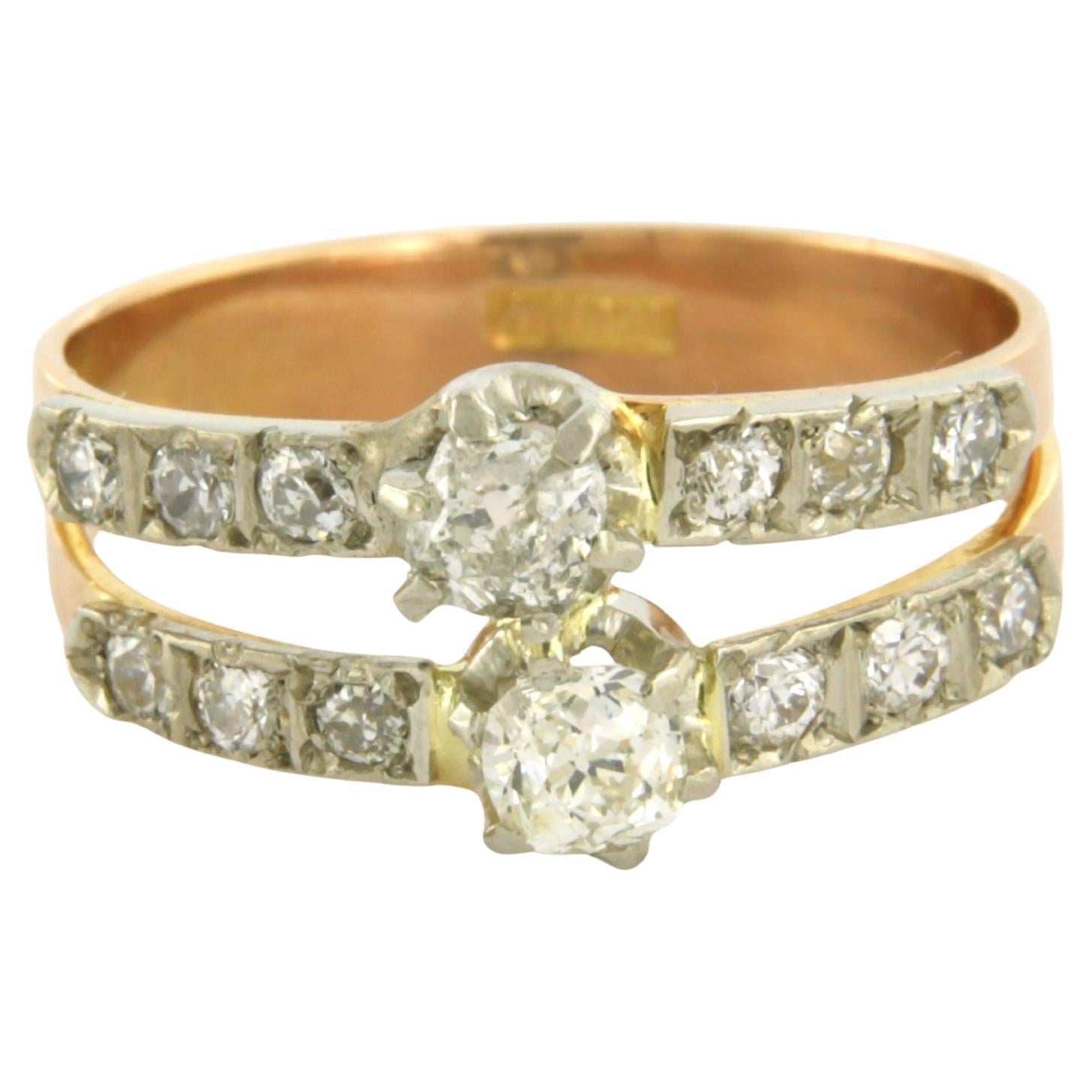 Bague avec diamants de taille ancienne jusqu
à 1,00ct Or 18k et argent 3,3 grammes