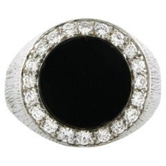 RIng with onyx and brilliant cut diamonds up to 0.50ct 13.4 grams 18k gold