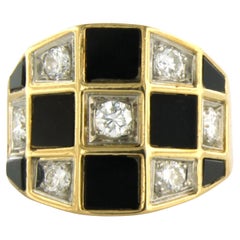 Bague en or bicolore 18 carats avec onyx et diamants