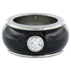 Ring with onyx and diamonds steel 