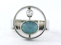Ring with opal and brilliant cut diamond up to 0.08ct 14k white gold 11.9 grams
