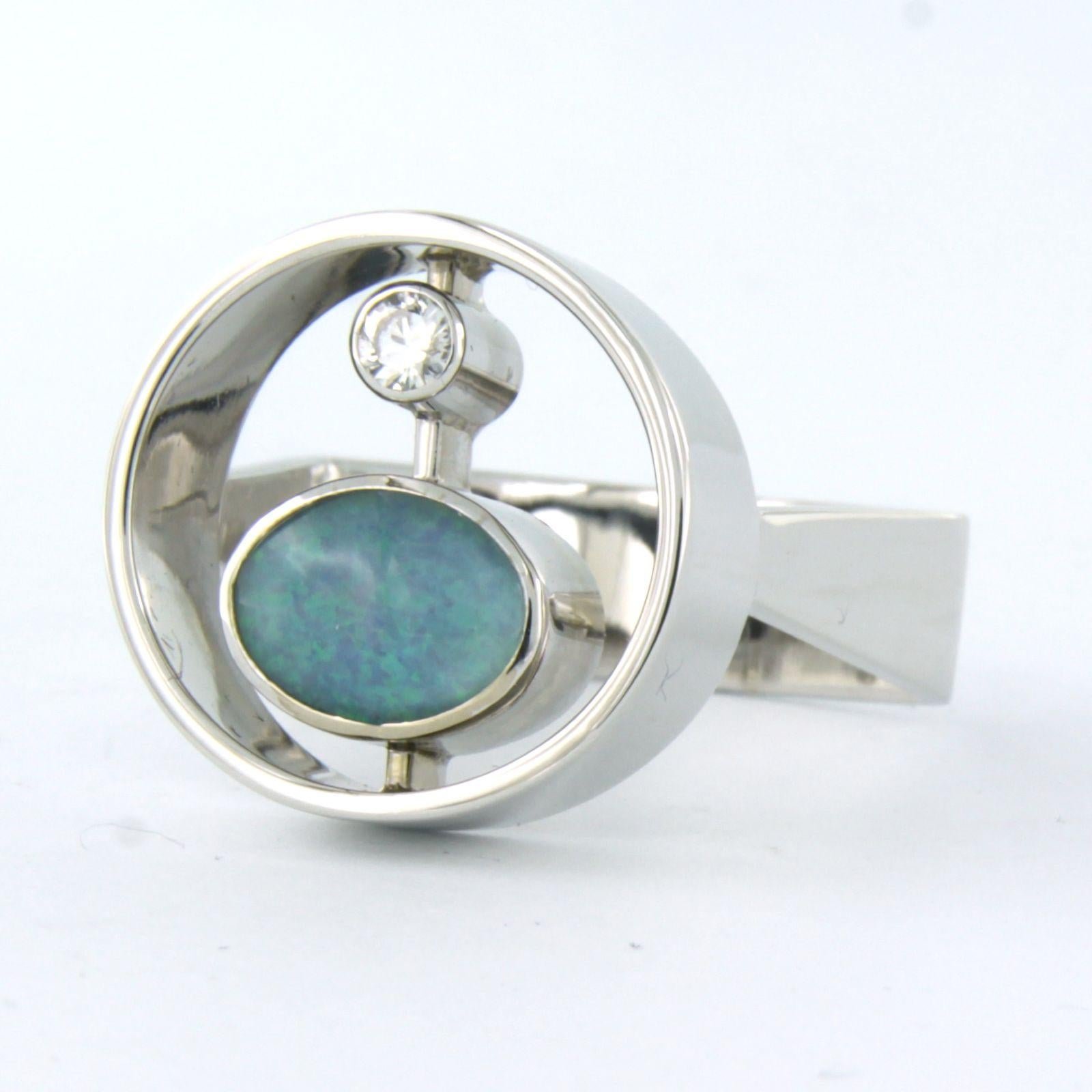 Modern Ring with opal and brilliant cut diamond up to 0.08ct 14k white gold For Sale