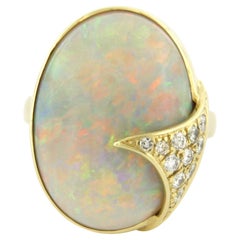ring with opal and brilliant cut diamonds up to 0.30ct 14k gold 11.0 grams