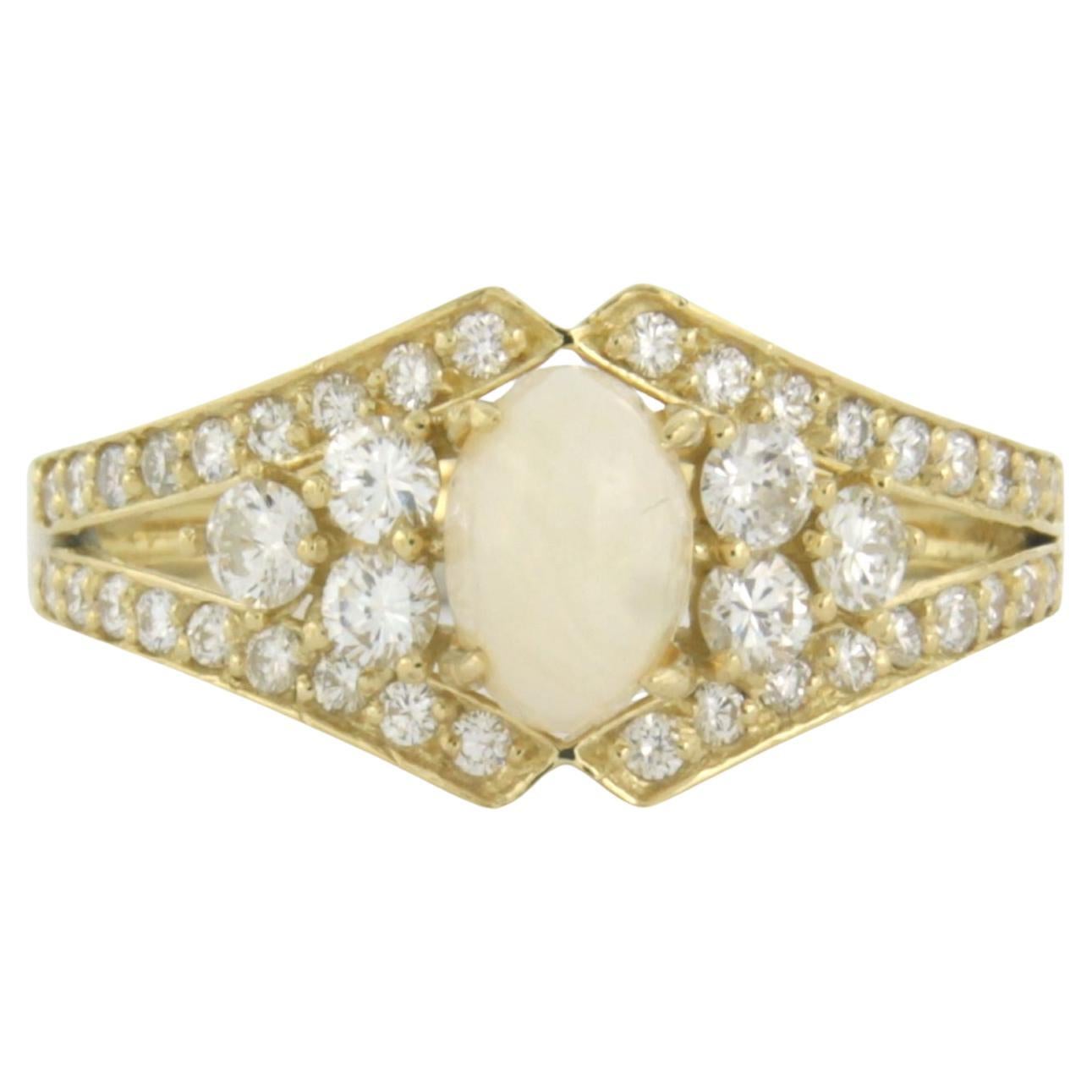 Ring with opal and brilliant cut diamonds up to 0.64ct 18k yellow gold