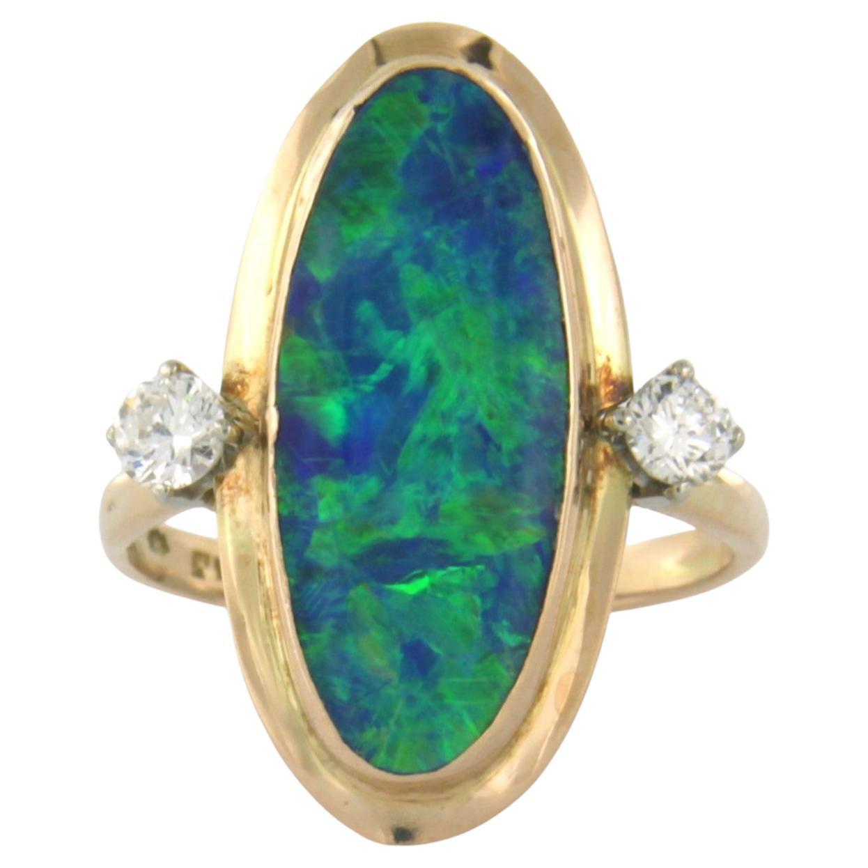 Ring with opal and diamond 14k yellow gold