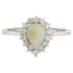 Ring with opal and diamond 18k white gold