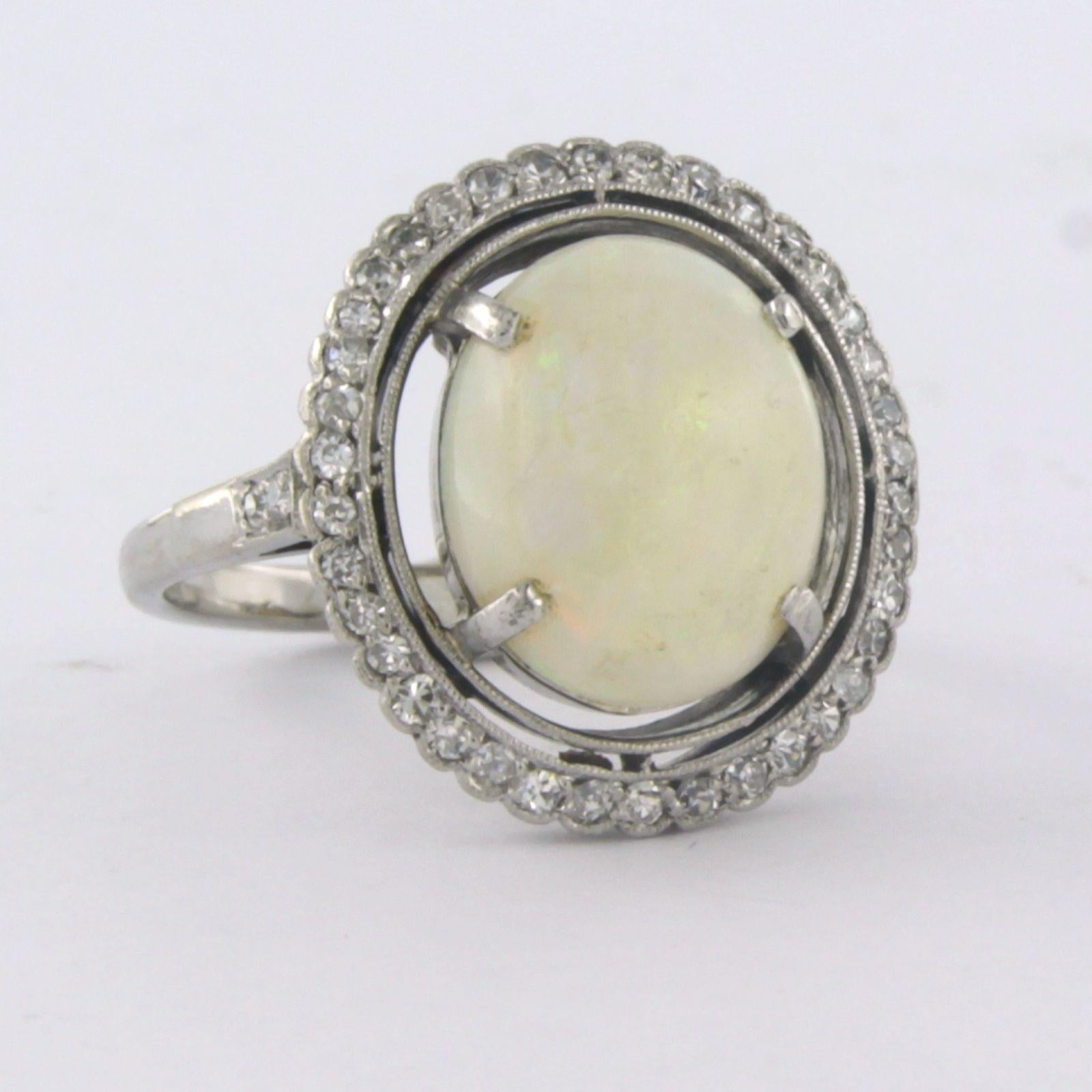 Modern Ring with opal and diamonds 14k white gold For Sale