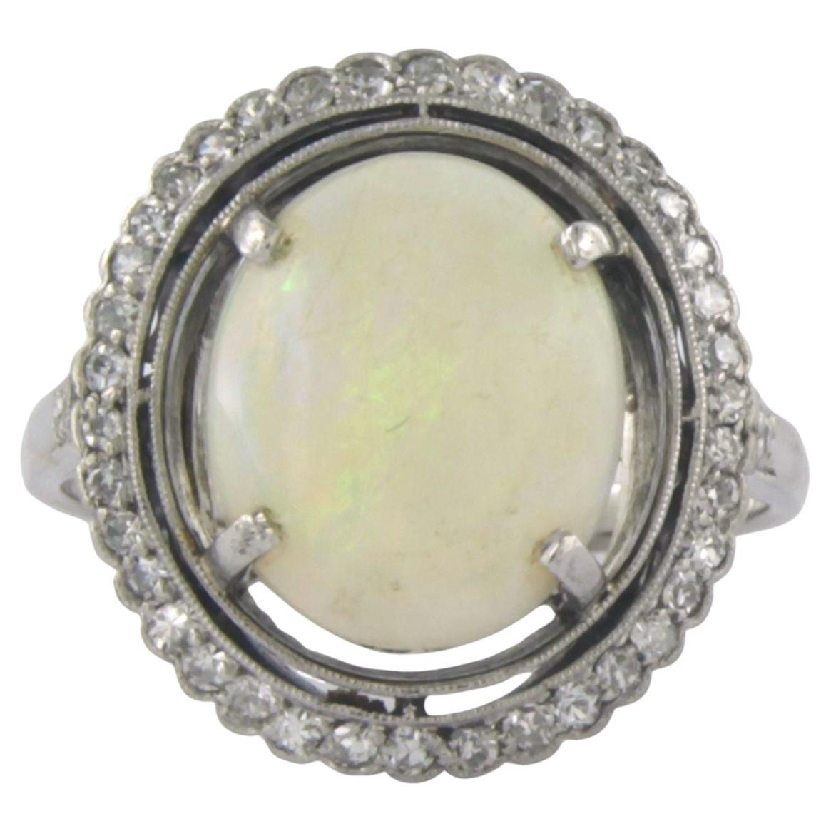 Ring with opal and diamonds 14k white gold For Sale