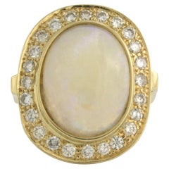 Ring with Opal and Diamonds 14k yellow gold