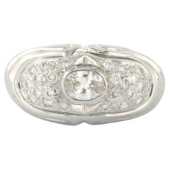 Ring with oval and brilliant cut diamonds up to 0.60ct 18k gold 7.4 grams
