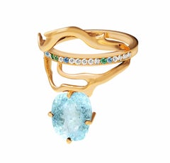 Ring with Paraiba Tourmaline, Diamonds and Sapphires in Yellow Gold