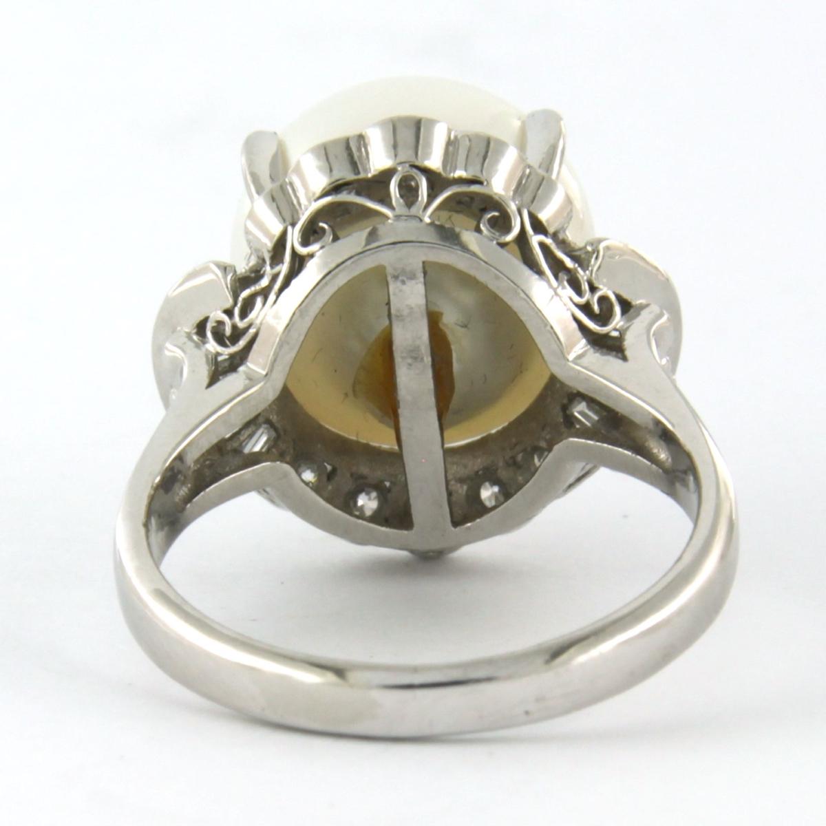 Brilliant Cut Ring with pearl and brilliant and taper cut diamonds up to 0.51ct platinum For Sale