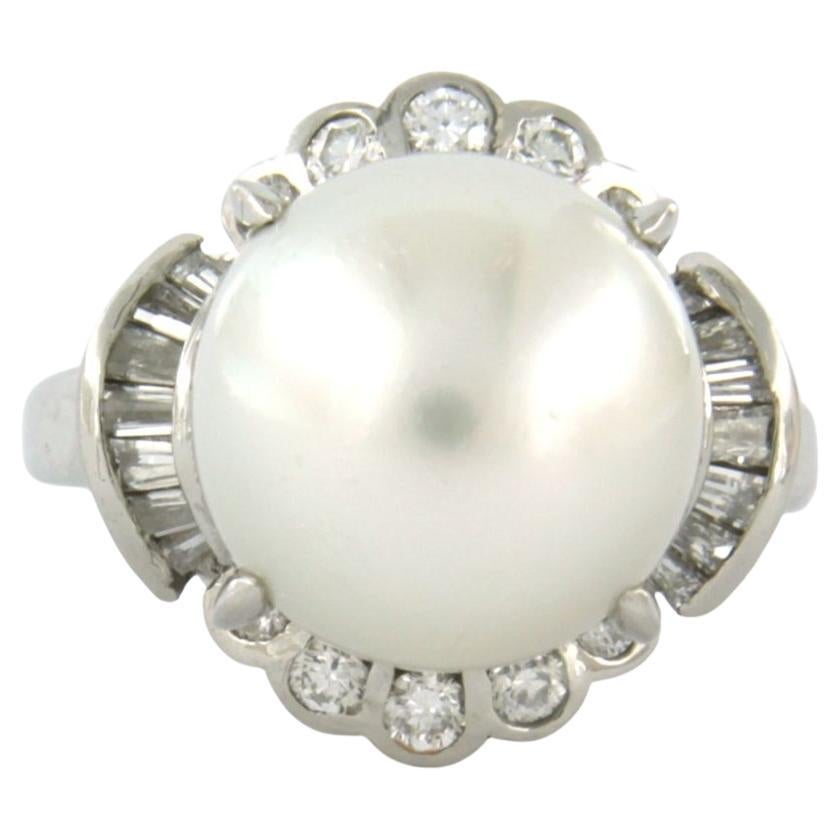 Ring with pearl and brilliant and taper cut diamonds up to 0.51ct platinum For Sale