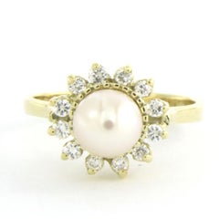 Ring with pearl and brilliant cut diamonds up to 0.30ct 14k gold 3.5 grams