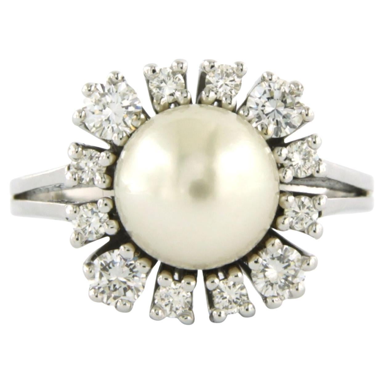 Anello con perla e diamanti taglio brillante fino a 0,52 carati in oro bianco 14k 5,8 grammi