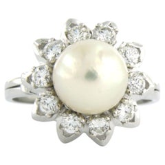Ring with pearl and brilliant cut diamonds up to 0.55ct 18k gold 7.8 grams
