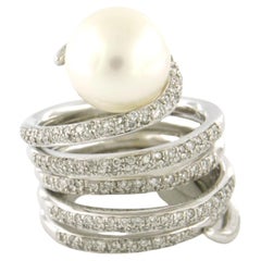 Anillo con perla y diamantes talla brillante hasta 1,00ct - 24,5 gramos - oro de 18k