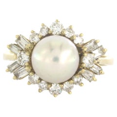 Ring with pearl and diamonds 14k yellow gold