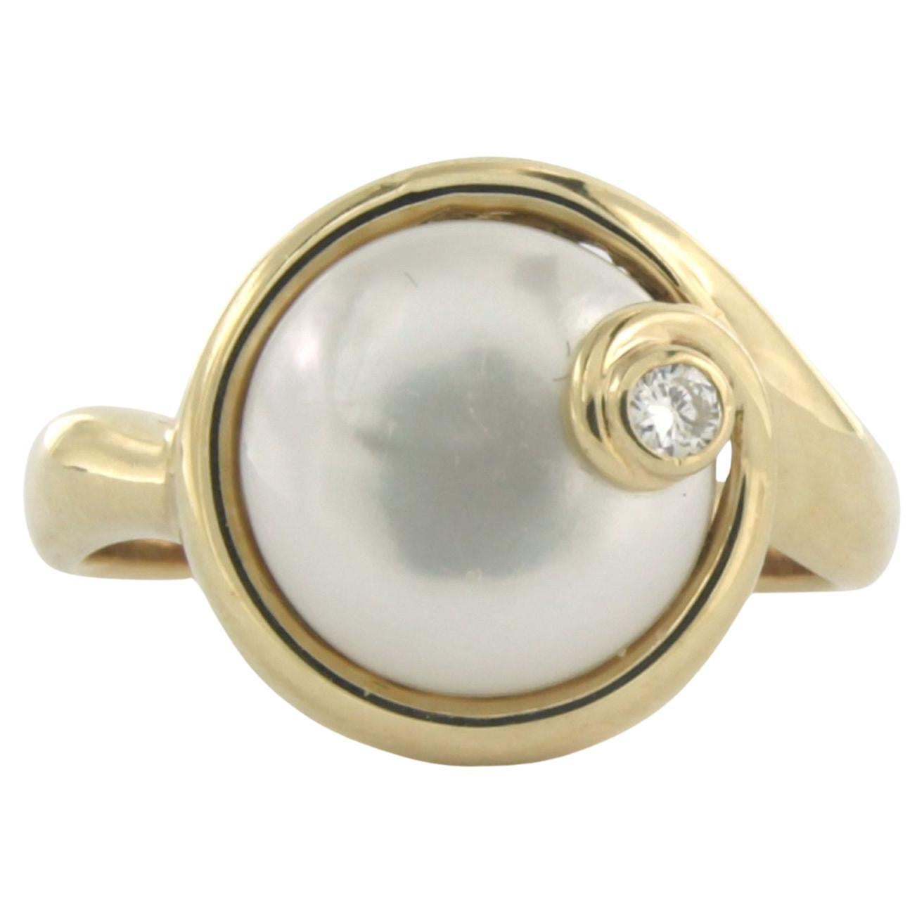 Ring with pearl and diamonds 14k yellow gold 