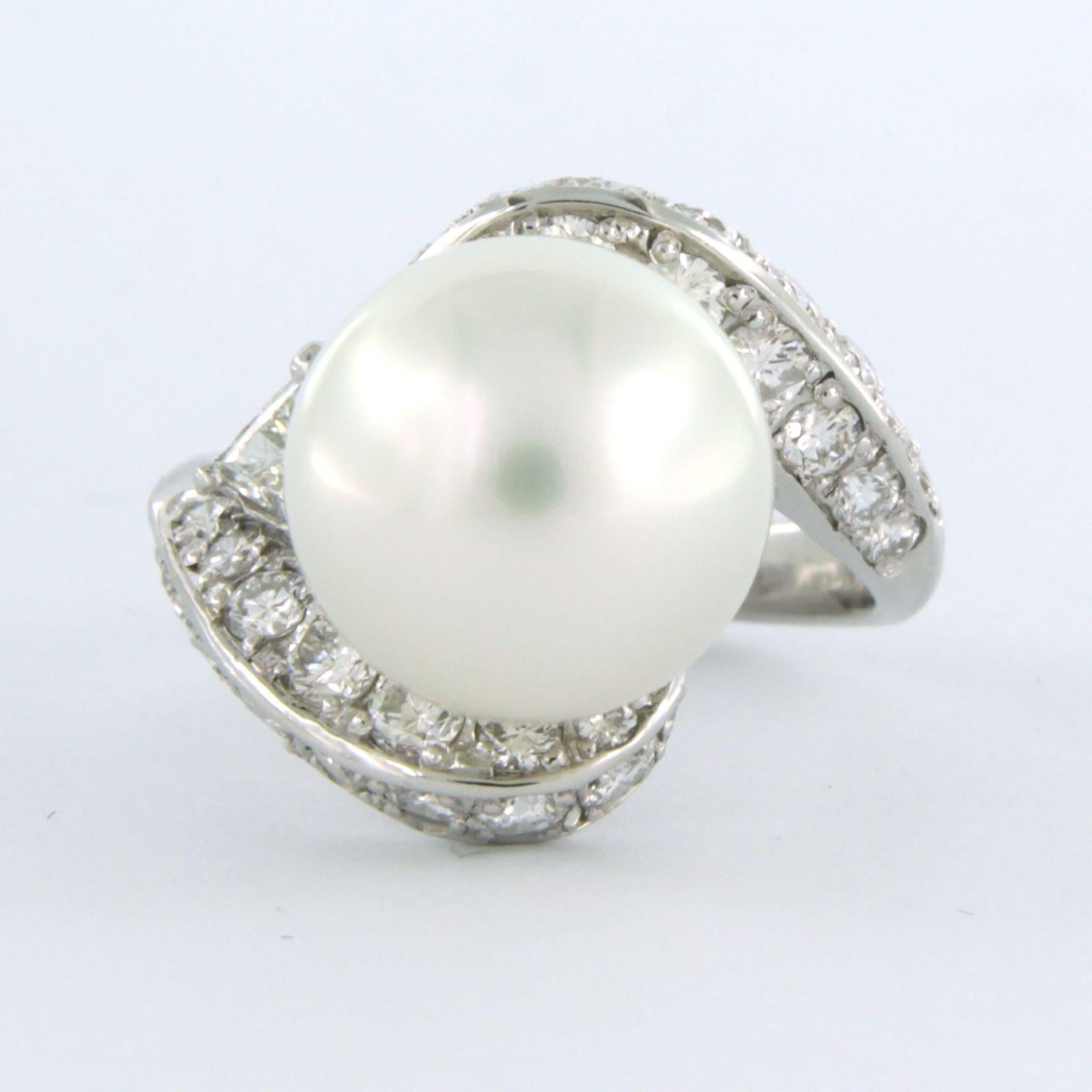Platinum ring set with pearl and brilliant cut diamond up to 1.41ct F/G - VS/SI - ring size US 5.75 - EU 16.25 (51)

detailed description:

top of the ring is 1.6 cm wide by 1.3 cm high

weight 8.8 grams

ring size US 5.75 - EU 16.25 (51), ring can