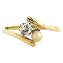 Ring with pearl and old mine cut diamond up to 0.25ct 18k gold