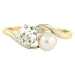 Ring with pearl and old mine cut diamond up to 0.65ct 18k gold