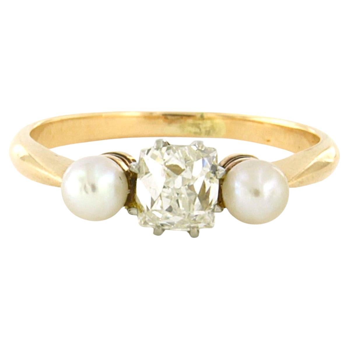 Ring with pearl and old mine cut diamond up to 0.98ct 14k gold and platinum