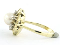 Bague avec perle et diamants taille simple jusqu'à 0,05 ct, or 14 carats, 4,1 grammes